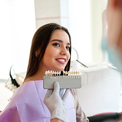 a dentist and patient discussing veneers during a consultation
