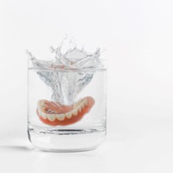 Dentures in a glass of water   