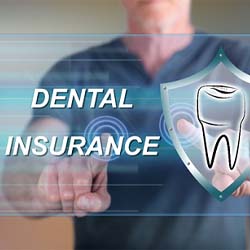 Man pointing to dental insurance on screen