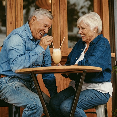 Senior couple on date with dentures in Garland