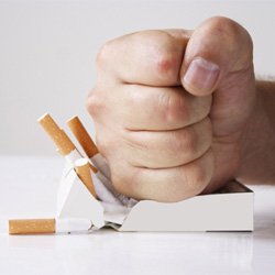 Man crushing cigarettes