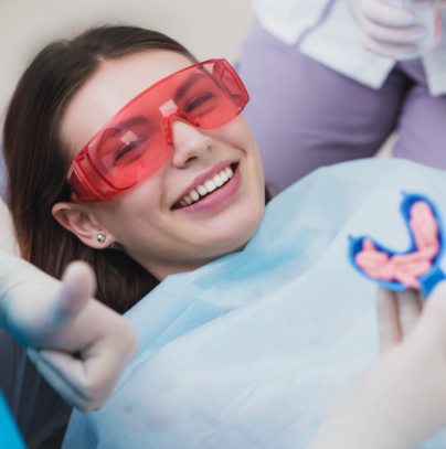 Child receiving fluoride treatment