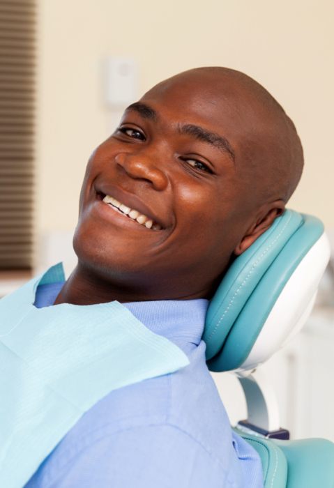 Man relaxing during sedation dentistry visit