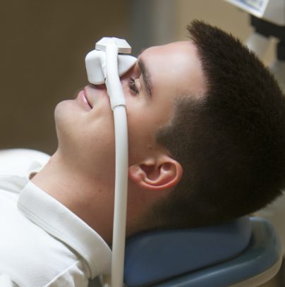 Relaxing patient under nitrous oxide dental sedation