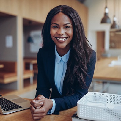 Businesswoman smiling at office