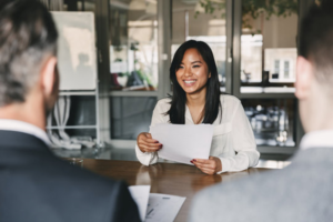 a person smiling during a job interview