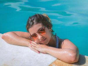 Young woman in swimming pool